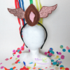 Tiara Vulva Livre - Vulva marrom com asas marrons.c